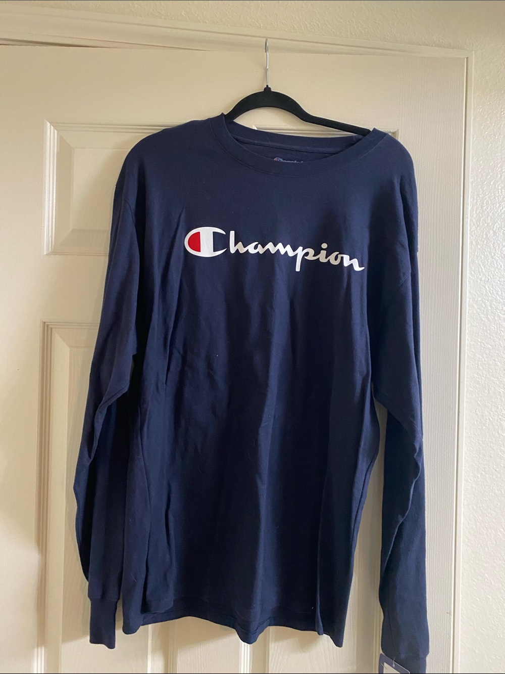 Champion Navy Long Sleeve Shirt with White Script and Red Accent
